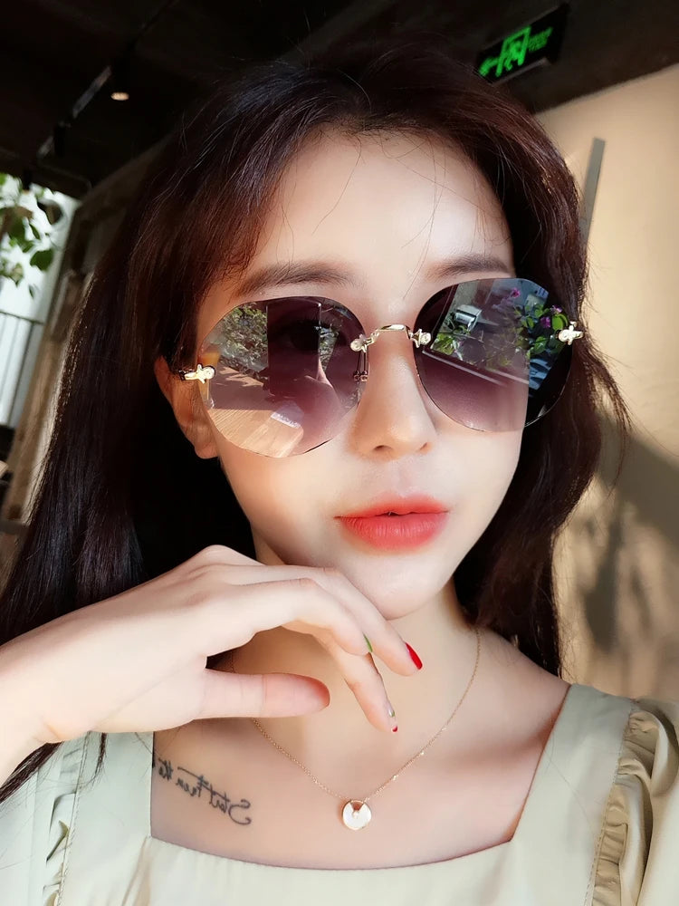 Fashion Rimless Trendy Sunglasses Women Round Cut Edge Gradient Color Sunglasses Gradient Sunglasses UV400 Rimless Shades