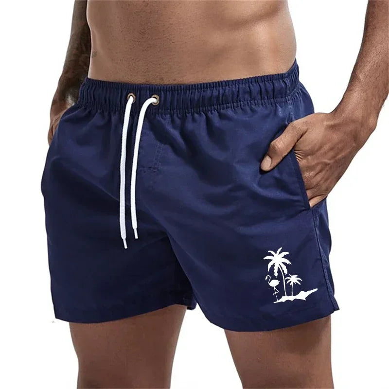 Pantalones cortos avec imprimé árbol de coco et flamenco para hombre, pantalons cortos de playa informales de verano, bañado
