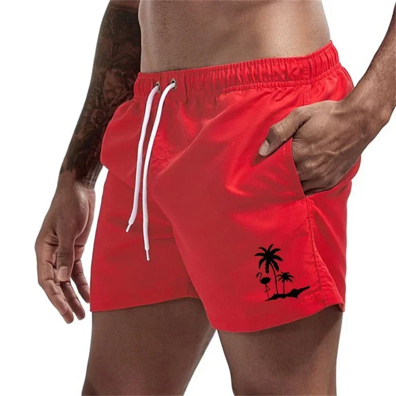 Pantalones cortos avec imprimé árbol de coco et flamenco para hombre, pantalons cortos de playa informales de verano, bañado
