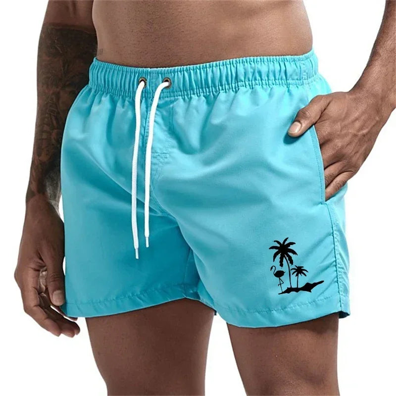 Pantalones cortos avec imprimé árbol de coco et flamenco para hombre, pantalons cortos de playa informales de verano, bañado