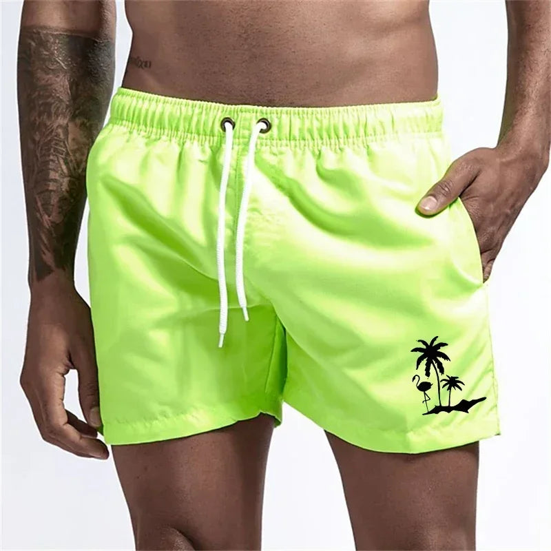 Pantalones cortos avec imprimé árbol de coco et flamenco para hombre, pantalons cortos de playa informales de verano, bañado