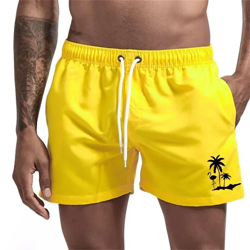 Pantalones cortos avec imprimé árbol de coco et flamenco para hombre, pantalons cortos de playa informales de verano, bañado
