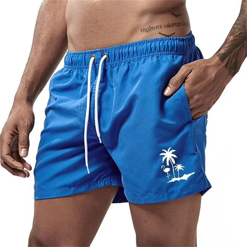 Pantalones cortos avec imprimé árbol de coco et flamenco para hombre, pantalons cortos de playa informales de verano, bañado